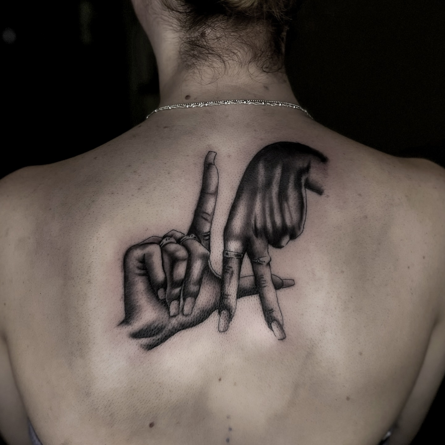 Hands realism tattoo on the back by @sadfoo_tattoo, Austin, Texas
