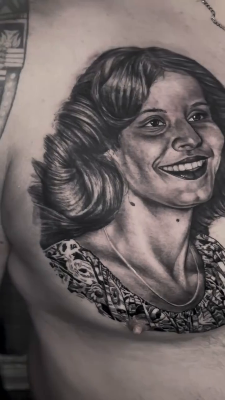 Portrait of a woman realism tattoo by James Moyer