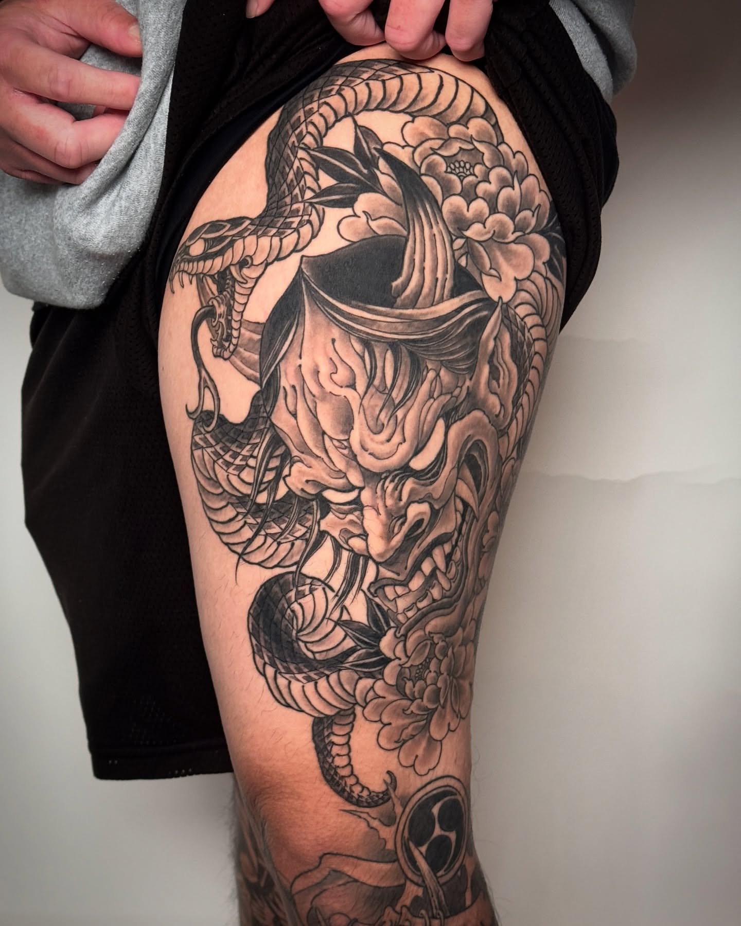 Snake and peony japanese irezumi tattoo on the thigh by Tattooer by Trade Wannabe Artist at Heart