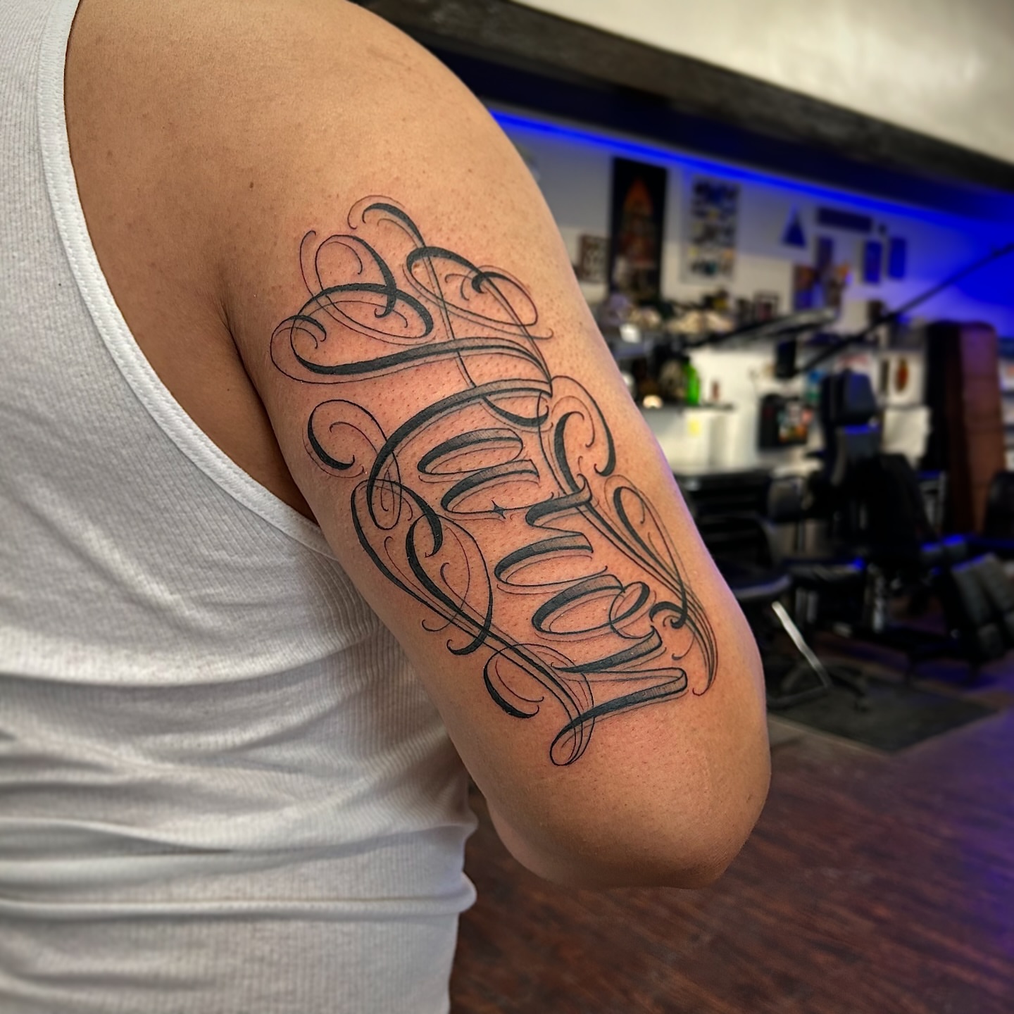 Script lettering lettering script tattoo on the upper arm by $krypt