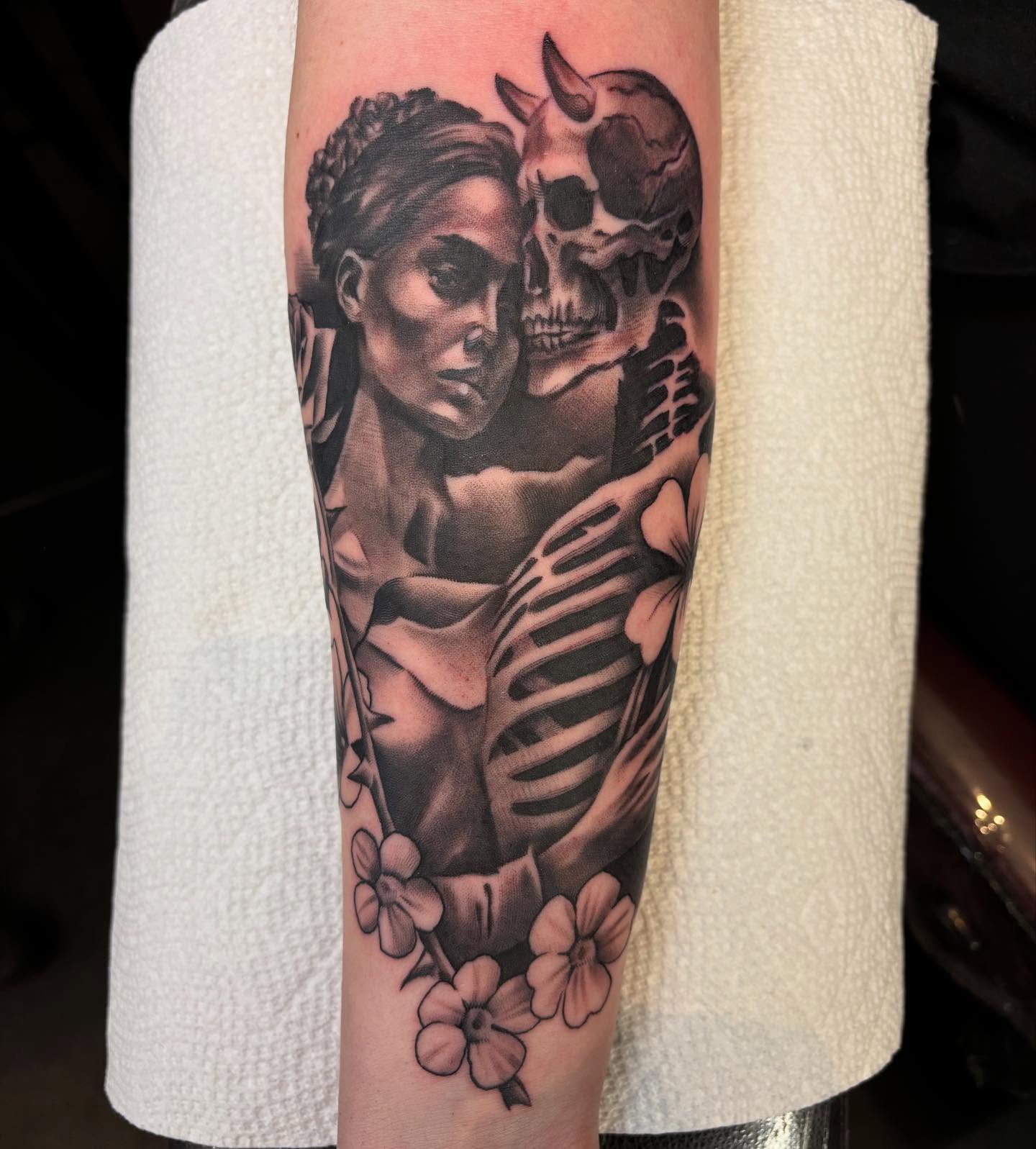 Woman and skeleton realism tattoo on the forearm by Mike Doherty, Abington, Massachusetts