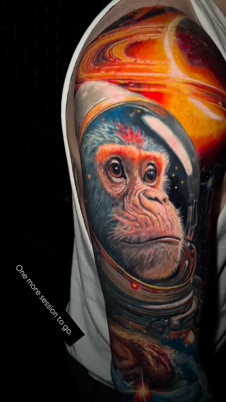 Astronaut chimpanzee in space realism tattoo by Caitlyn Campbell