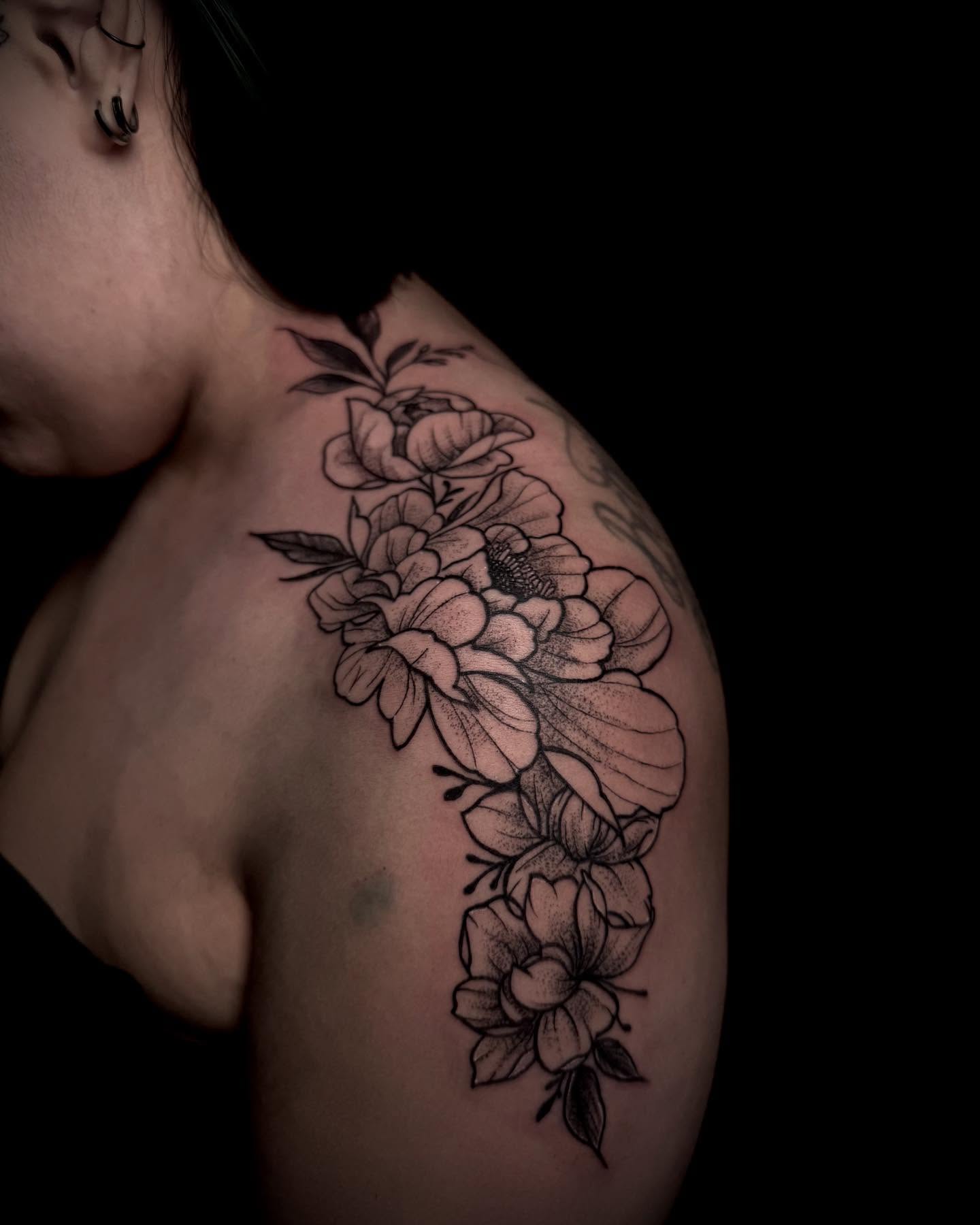 Floral arrangement dotwork tattoo on the shoulder by Fire-Breathing Bitch Queen
