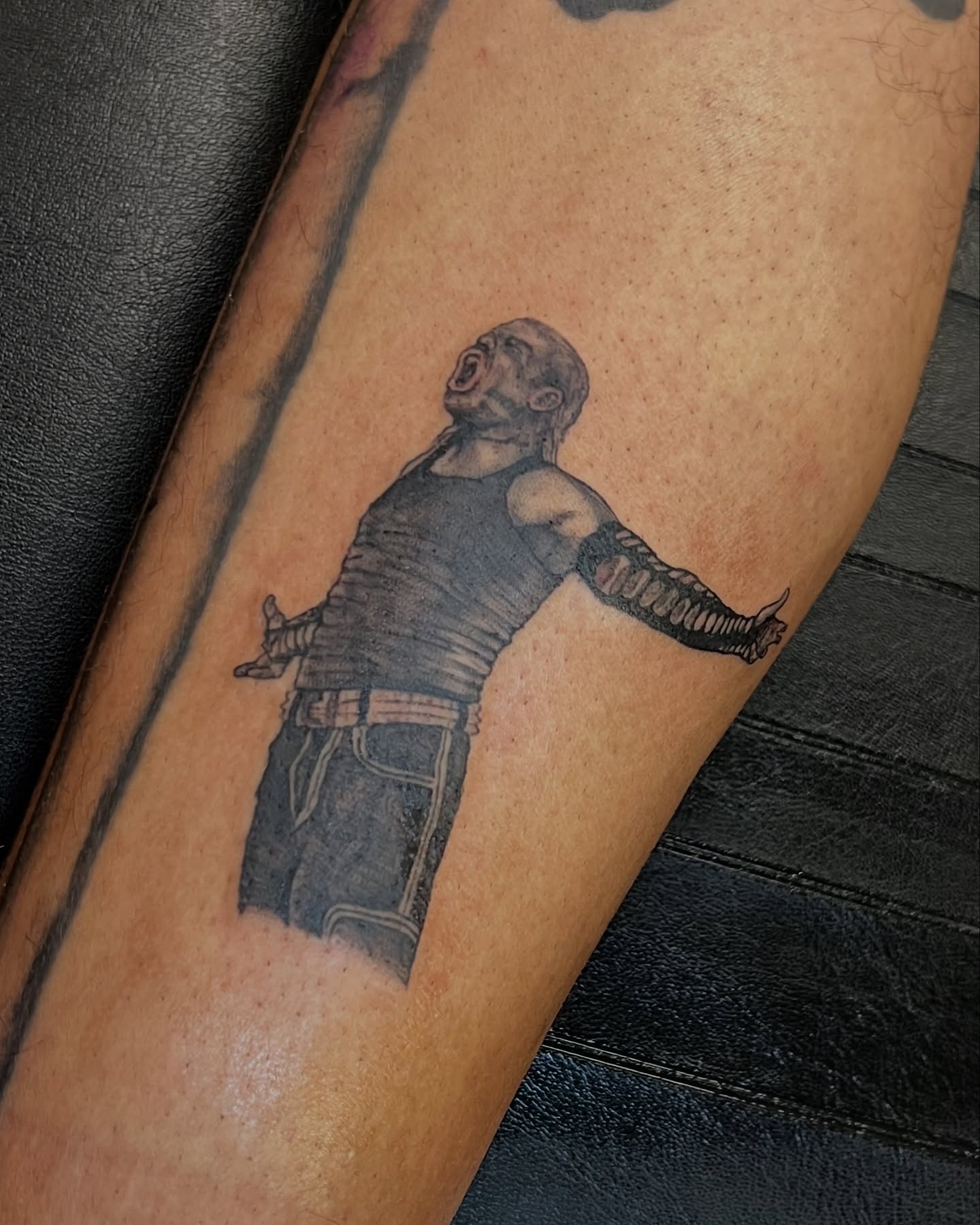 Man in armor black and grey tattoo on the forearm by tatman cris 🥀 dfw tattoo artist