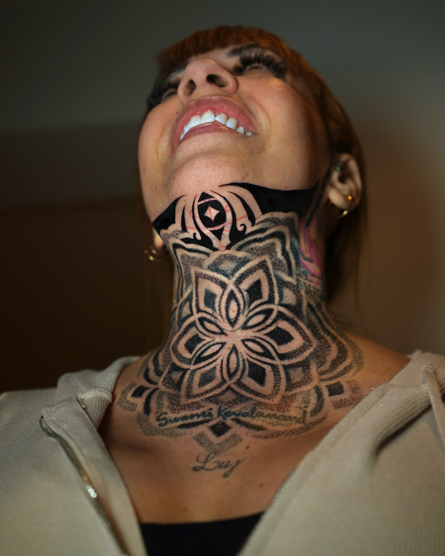 Mandala dotwork tattoo on the neck by Luis Gil