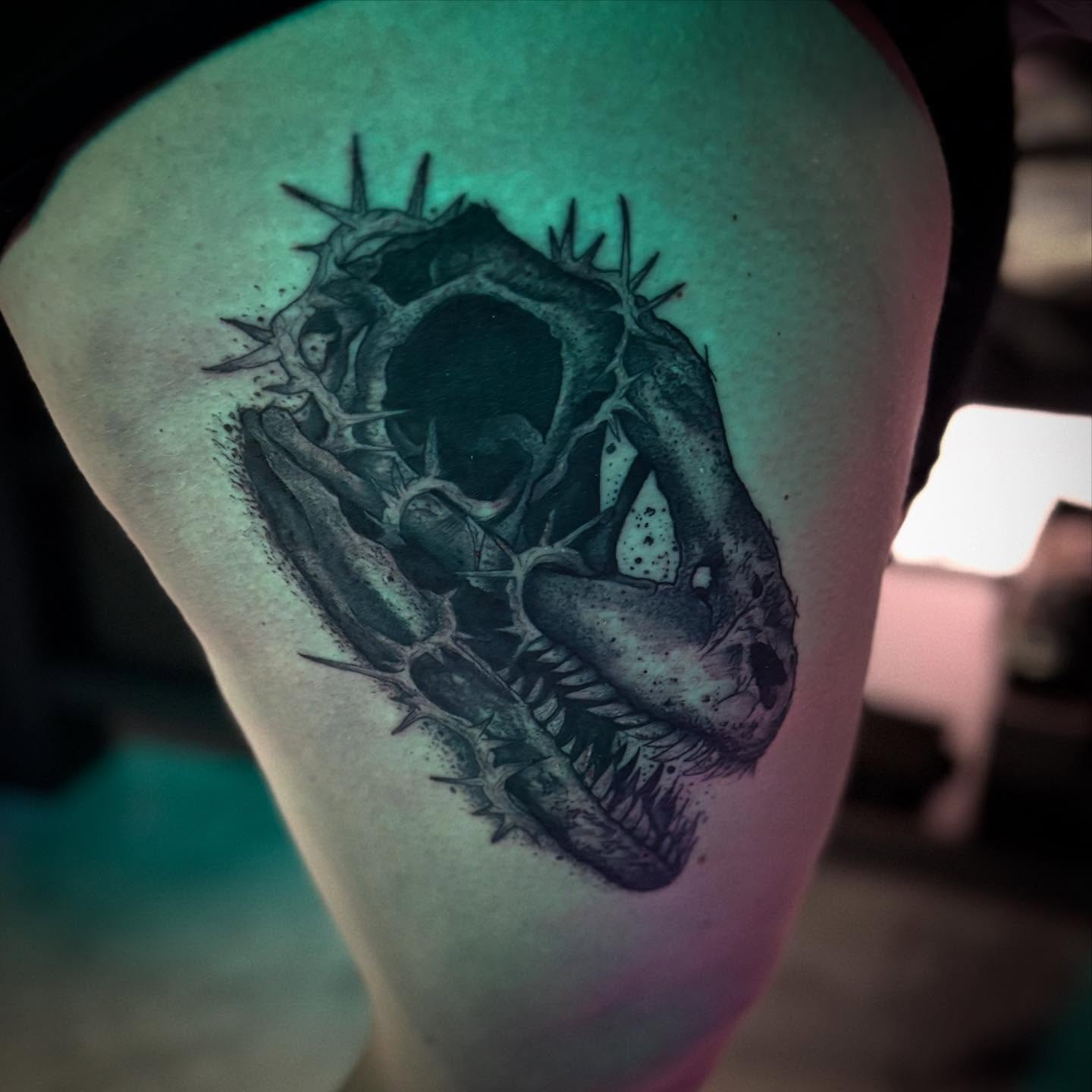 Tattooed skull dark realism tattoo on the thigh by AaronAdlerTattoos.com, Cincinnati