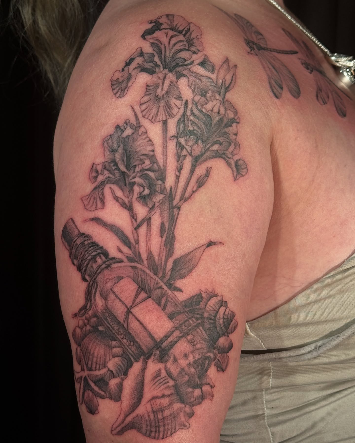 Floral arrangement with warrior realism tattoo on the shoulder by Paul Jack II ⚜️ Tattoo Artist ⚜️Atlanta
