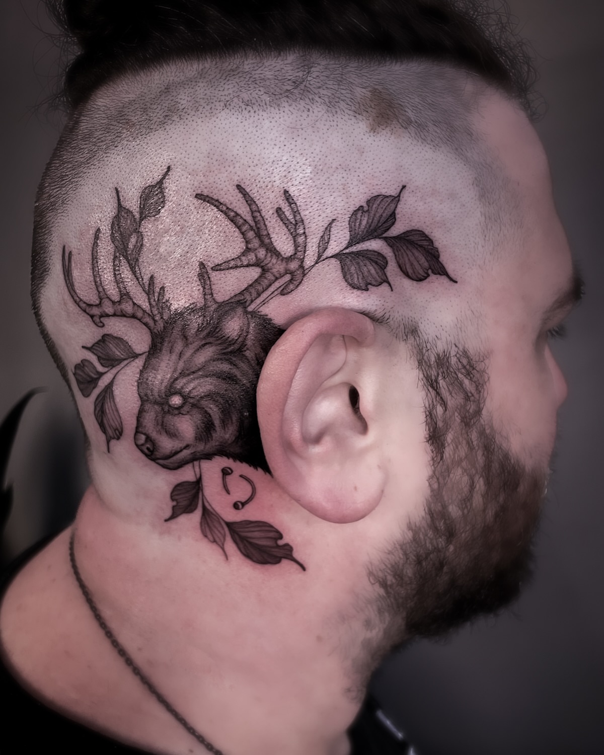 Stag head black and grey tattoo on the neck by 𝒥𝓊𝓃𝒾𝓅𝑒𝓇 𝒫𝑜𝓈𝓉 (Juju)
