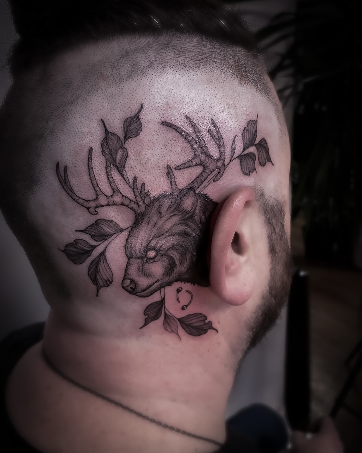 Stag head with leaves black and grey tattoo on the neck by 𝒥𝓊𝓃𝒾𝓅𝑒𝓇 𝒫𝑜𝓈𝓉 (Juju)