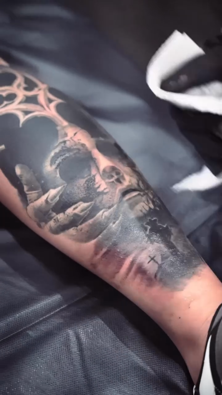 Skull and clouds dark realism tattoo by Bernie calderon, Fresno, California