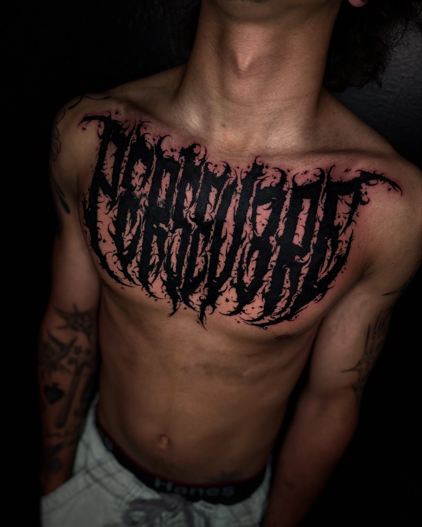 Script lettering lettering script tattoo on the chest by Isaac