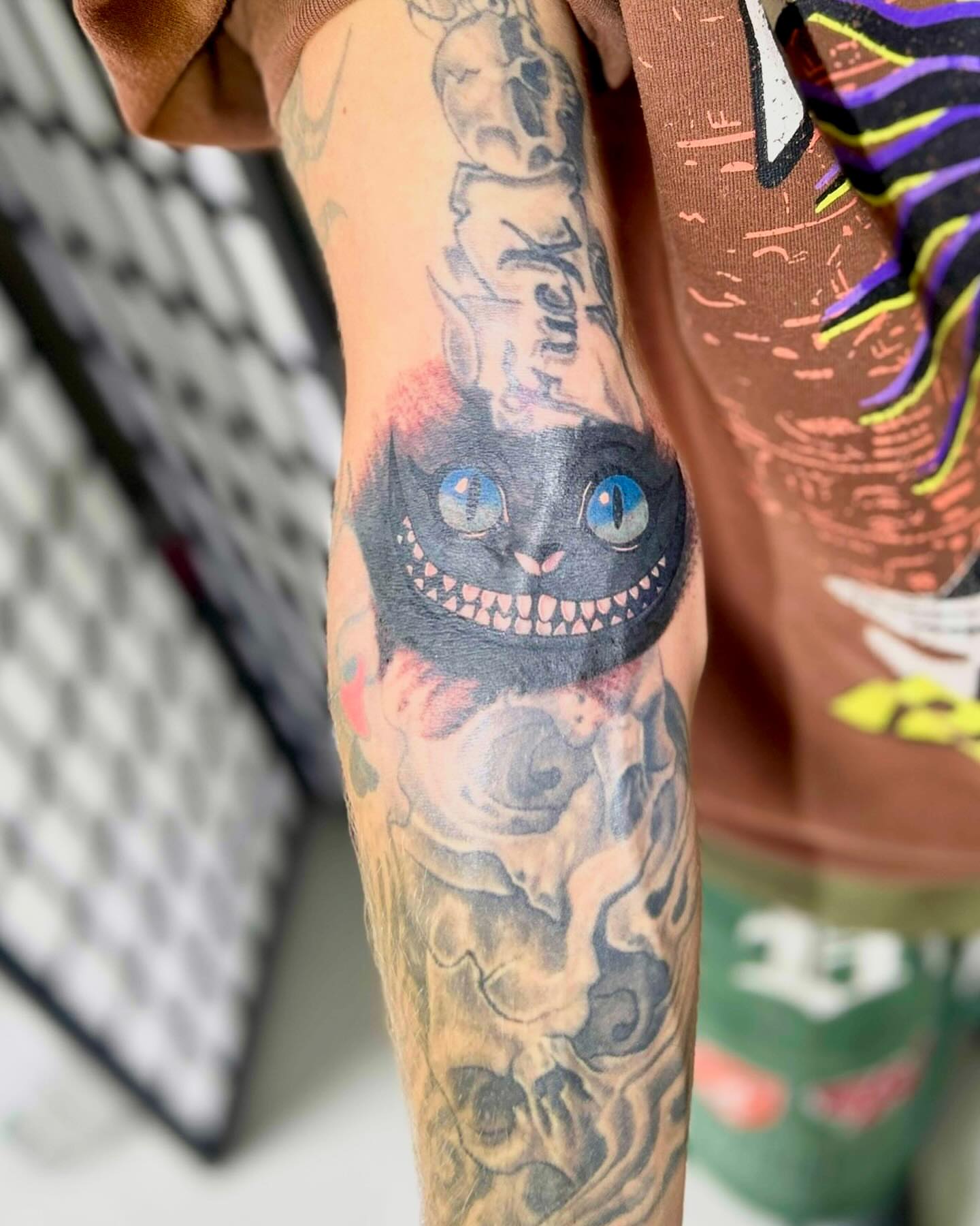 Cheshire Cat American traditional tattoo on the forearm by ɢɢ sᴛʏʟᴇs