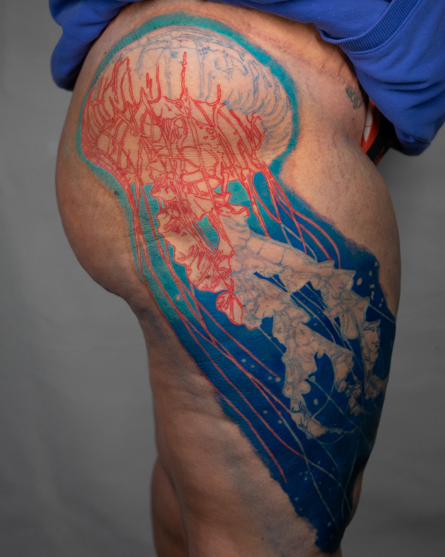 Jellyfish dotwork tattoo on the thigh by Nate