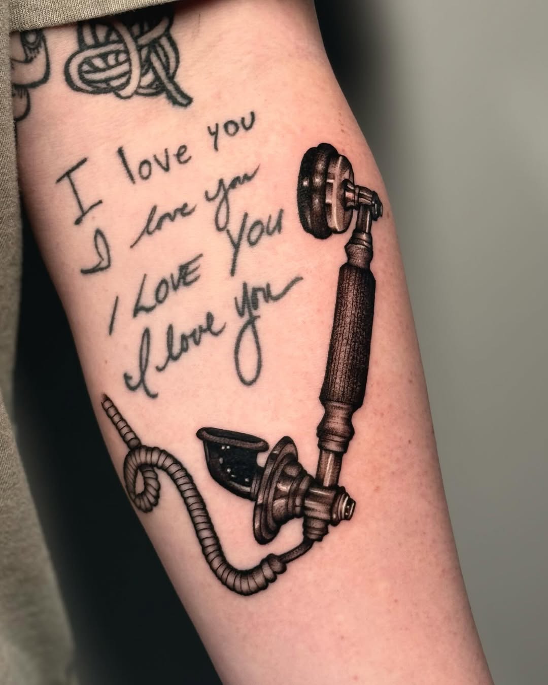 Tattoo by @slightlyorange — lettering_script, black_and_grey