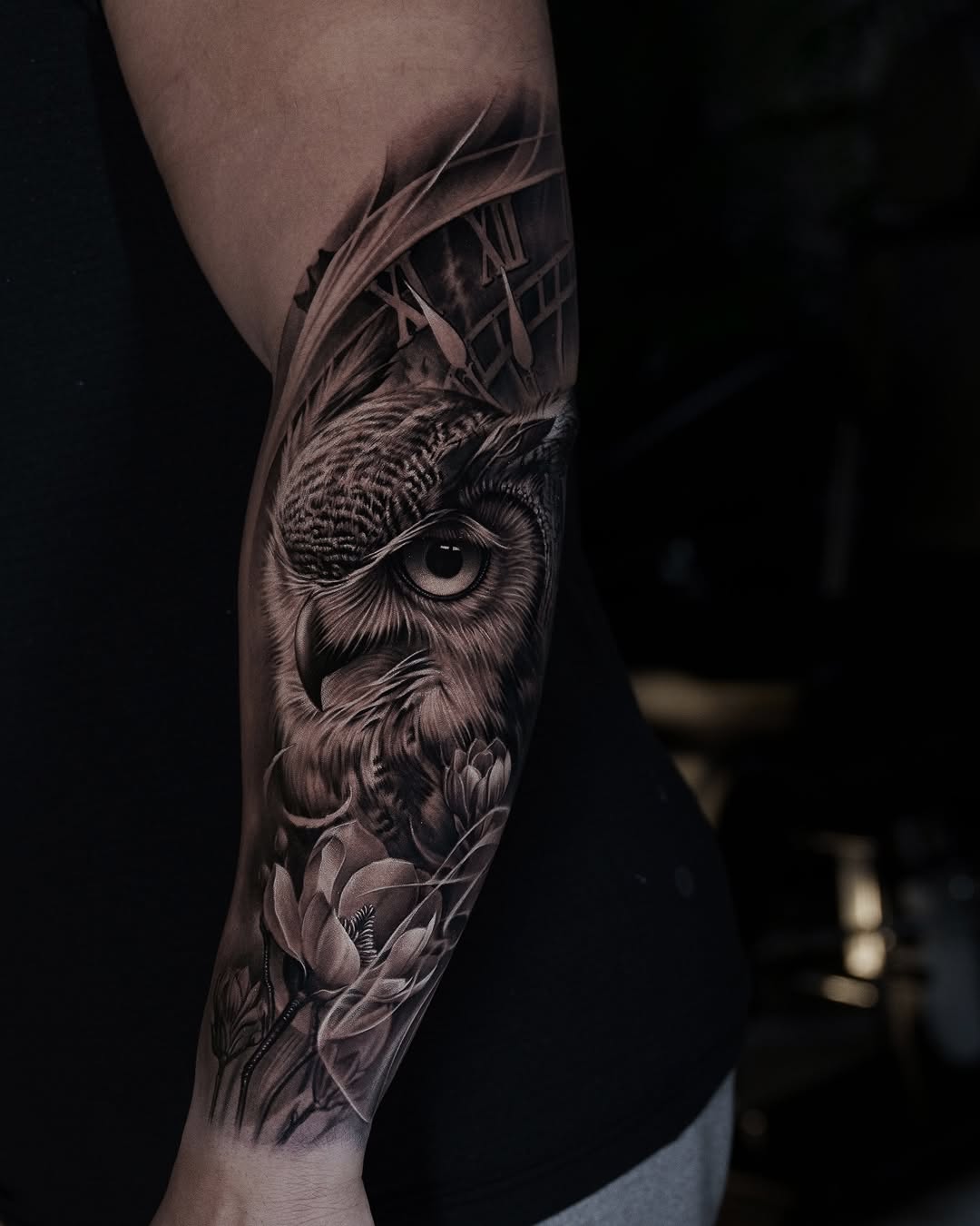 Owl and flowers with clock realism tattoo on the forearm by @_garart_