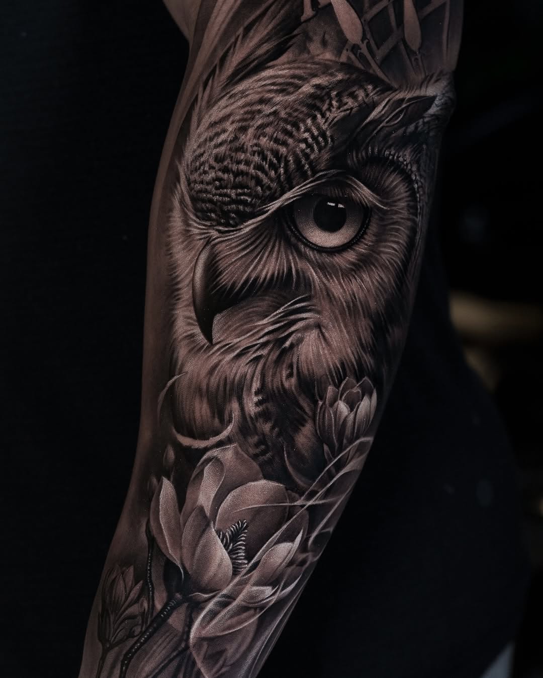 Owl and flowers realism tattoo on the forearm by @_garart_