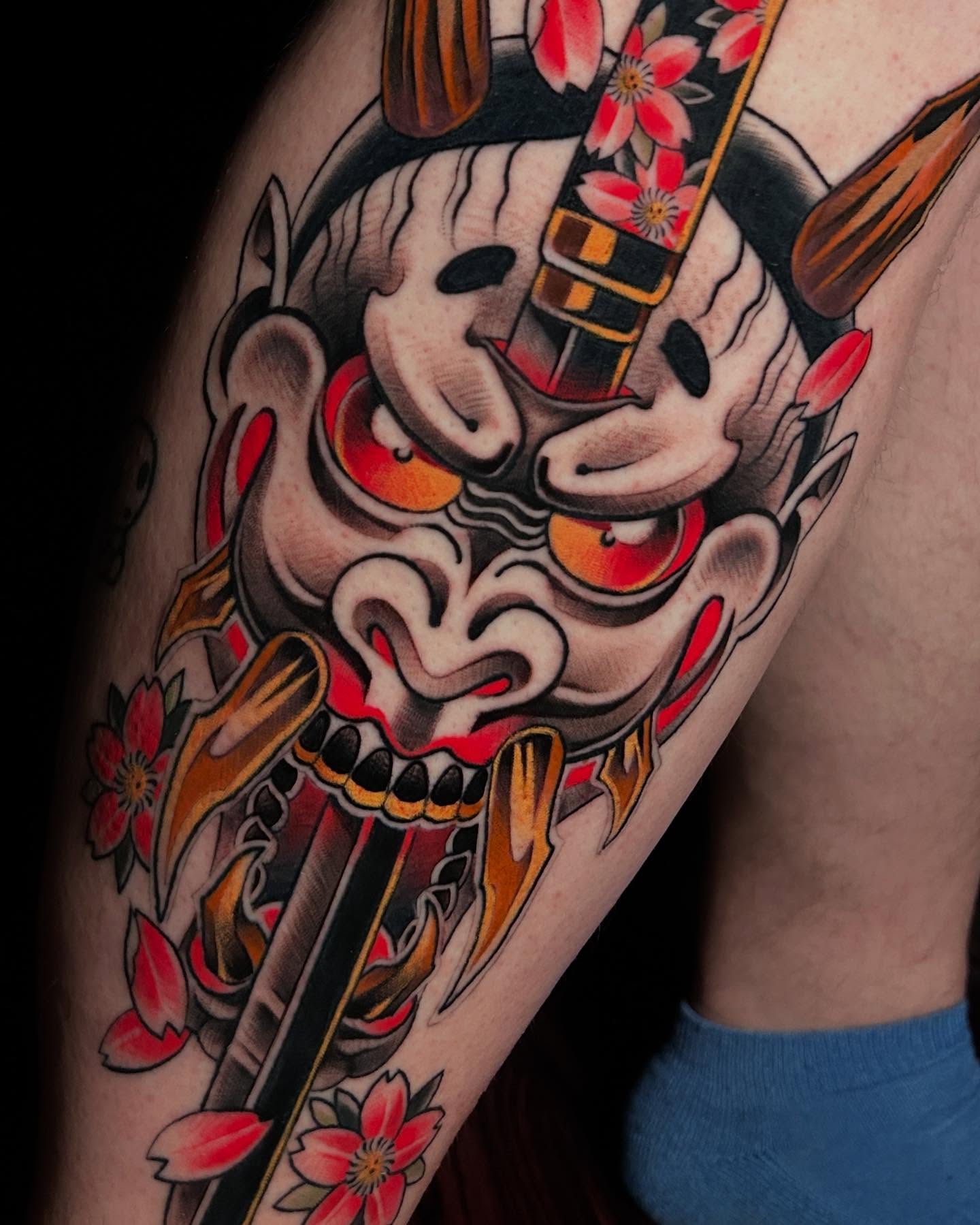 Demon mask American traditional tattoo on the forearm by Rat Girl, Dayton, Ohio