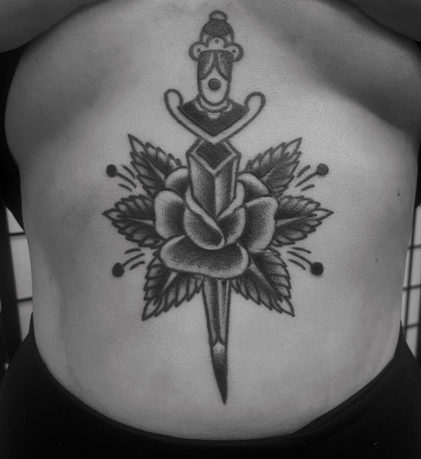 Sword and rose American traditional tattoo on the ribs by adamsayre, San Diego, California