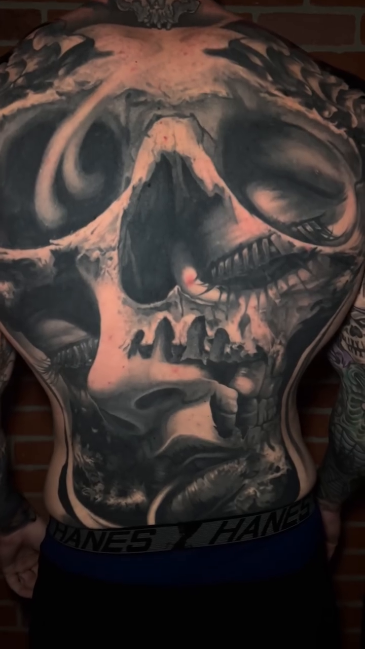 Skull and figures realism tattoo by Raul Ugarte, Roseville, California