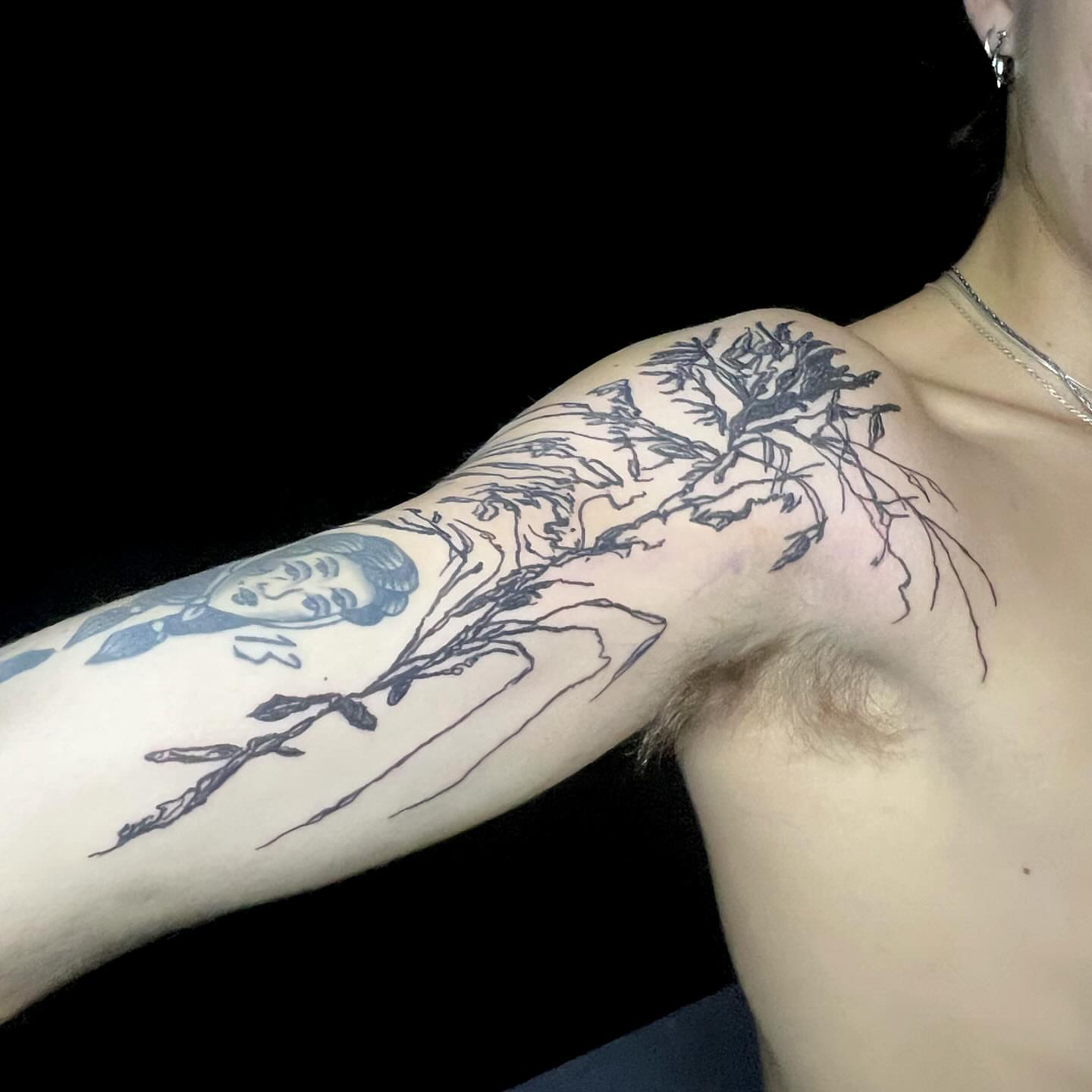 Portrait and tree black and grey tattoo on the shoulder by @godsfirmgrip