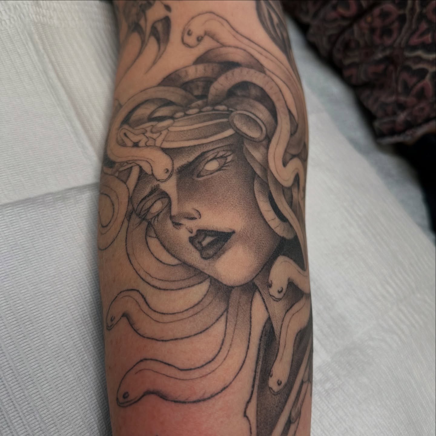 Medusa black and grey tattoo on the forearm by Juan Vega (tony)
