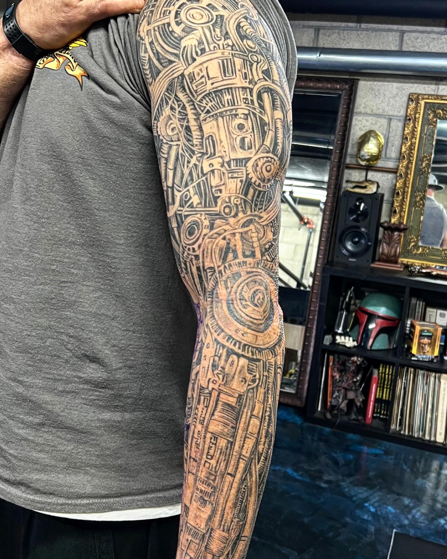 Mechanical gears geometric tattoo on the forearm by Creeper tattoo