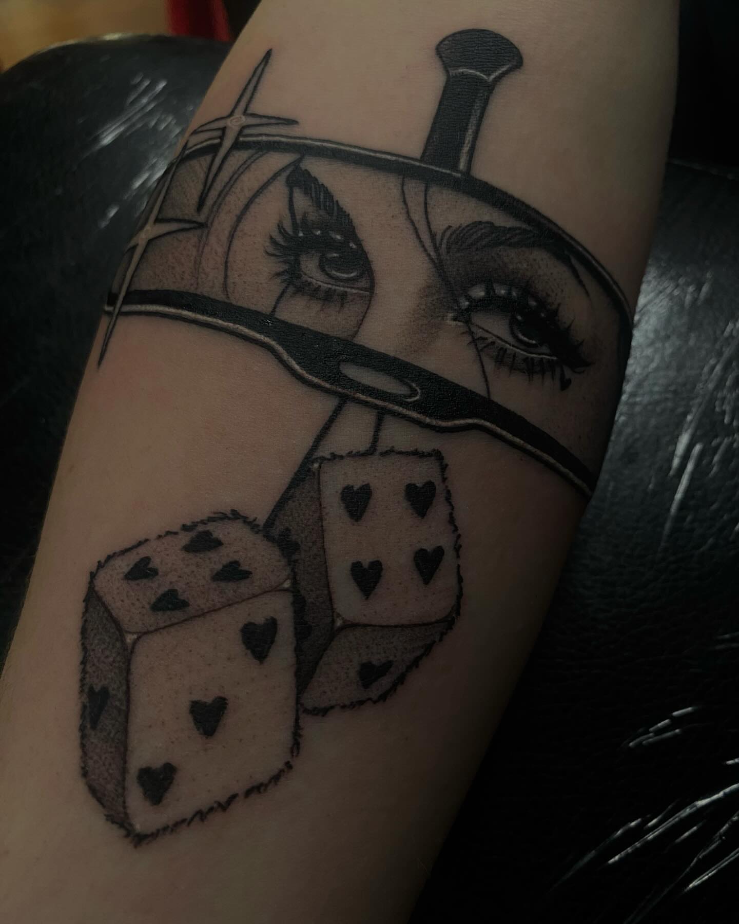 Eyes and dice realism tattoo on the forearm by 𝔗𝔞𝔶𝔩𝔬𝔯 𝔈𝔩𝔦𝔷𝔞𝔟𝔢𝔱𝔥, Tulsa, Oklahoma