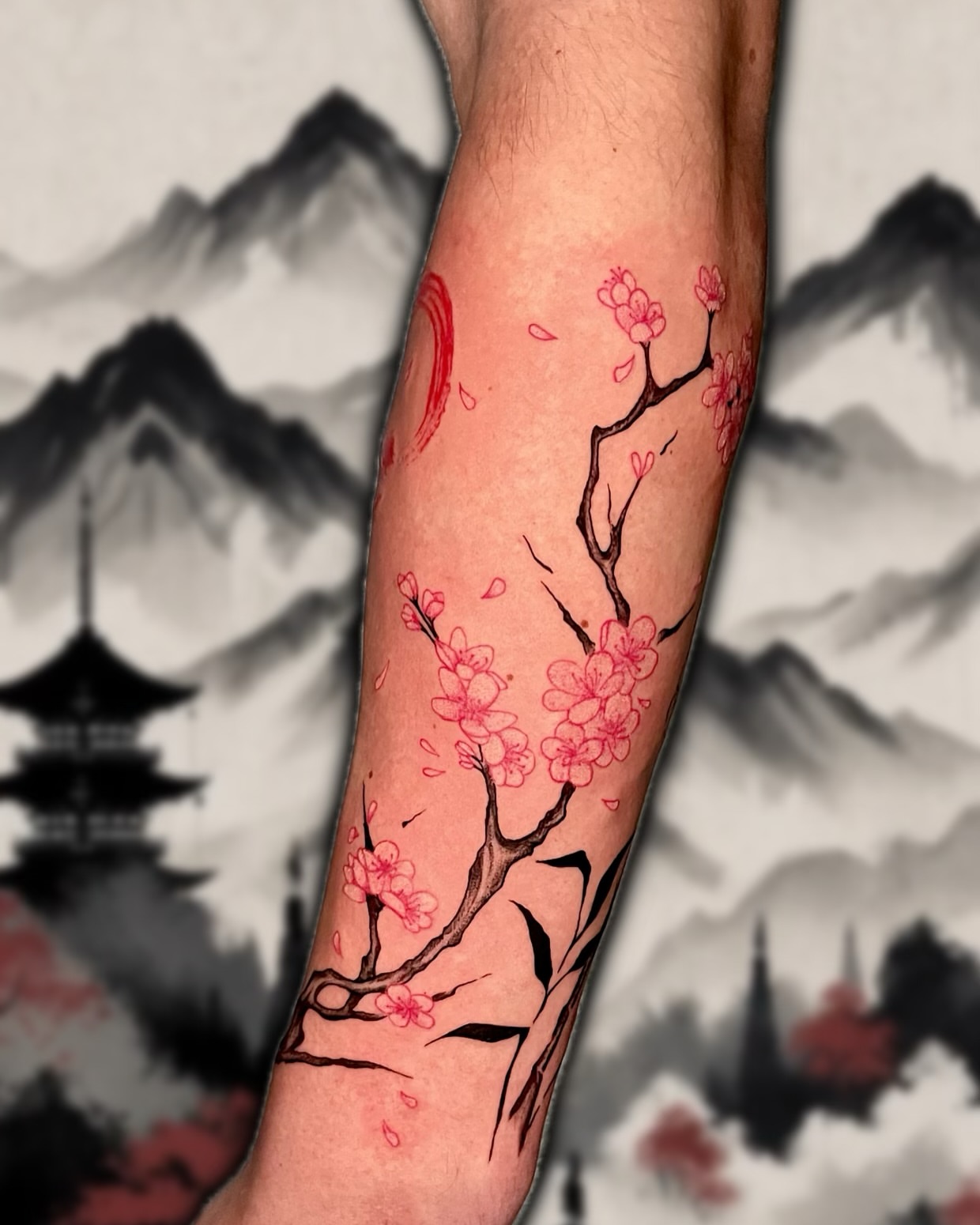 Cherry blossom branch dotwork tattoo on the forearm by Shontel Fowler