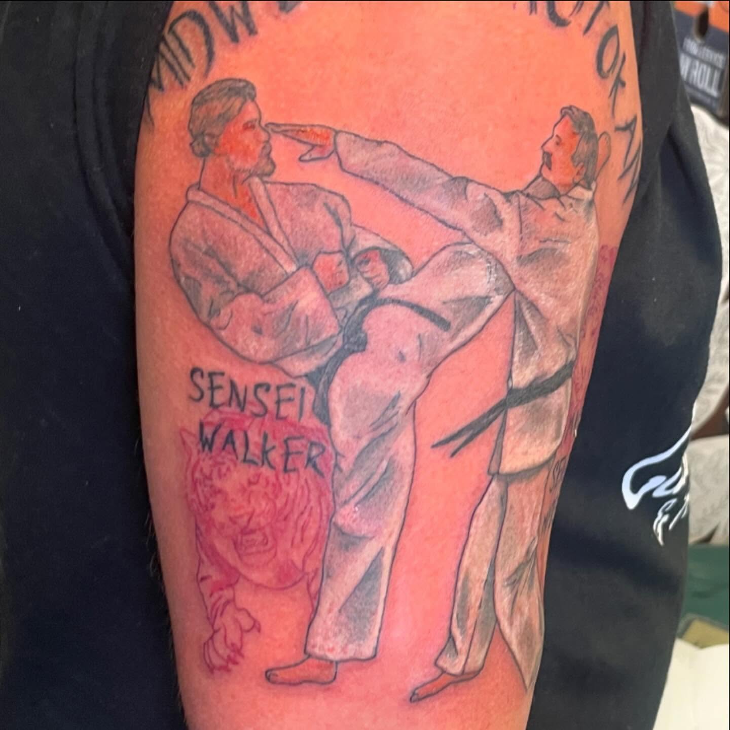 Karate scene realism tattoo on the forearm by Evan