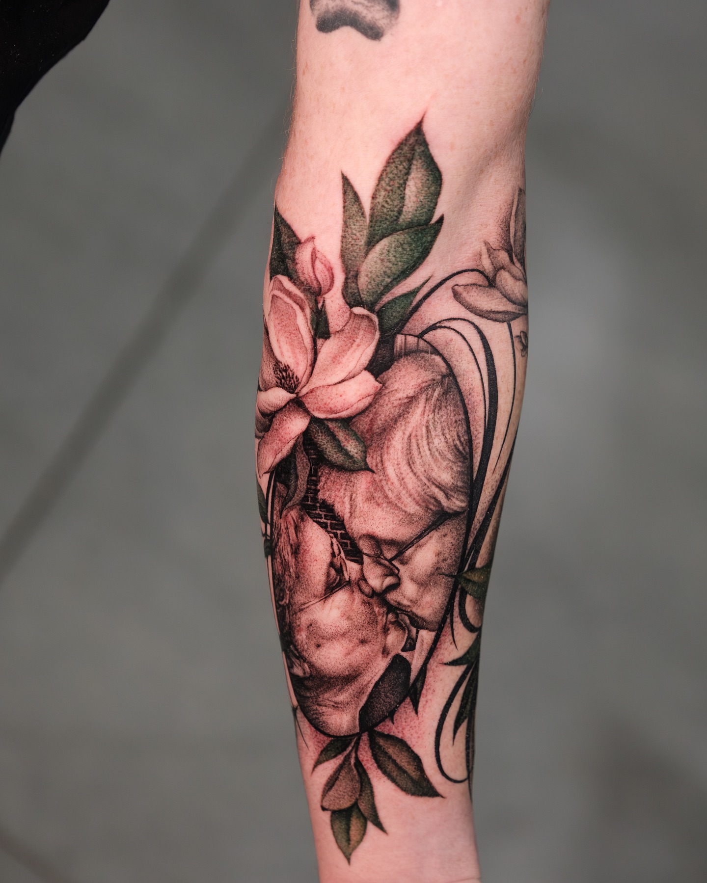 Woman with flowers realism tattoo on the forearm by Ohio Tattoo Artist - Tehya Maxwell, Springfield, Ohio