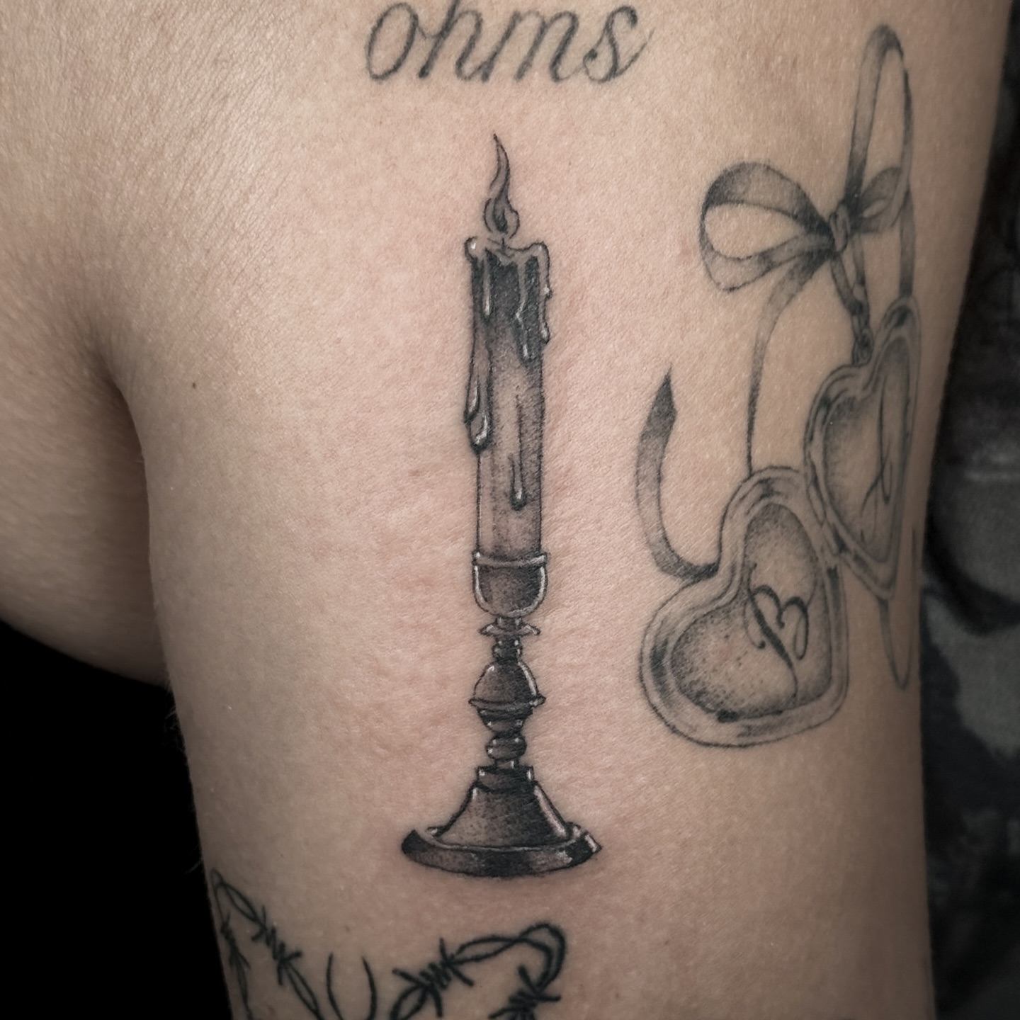 Candle and heart black and grey tattoo on the thigh by @sadfoo_tattoo, Austin, Texas