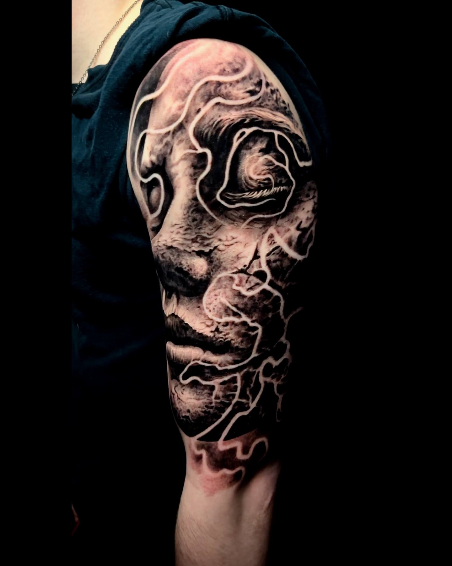 Topographic map realism tattoo on the forearm by Dark Shadows Tattoo