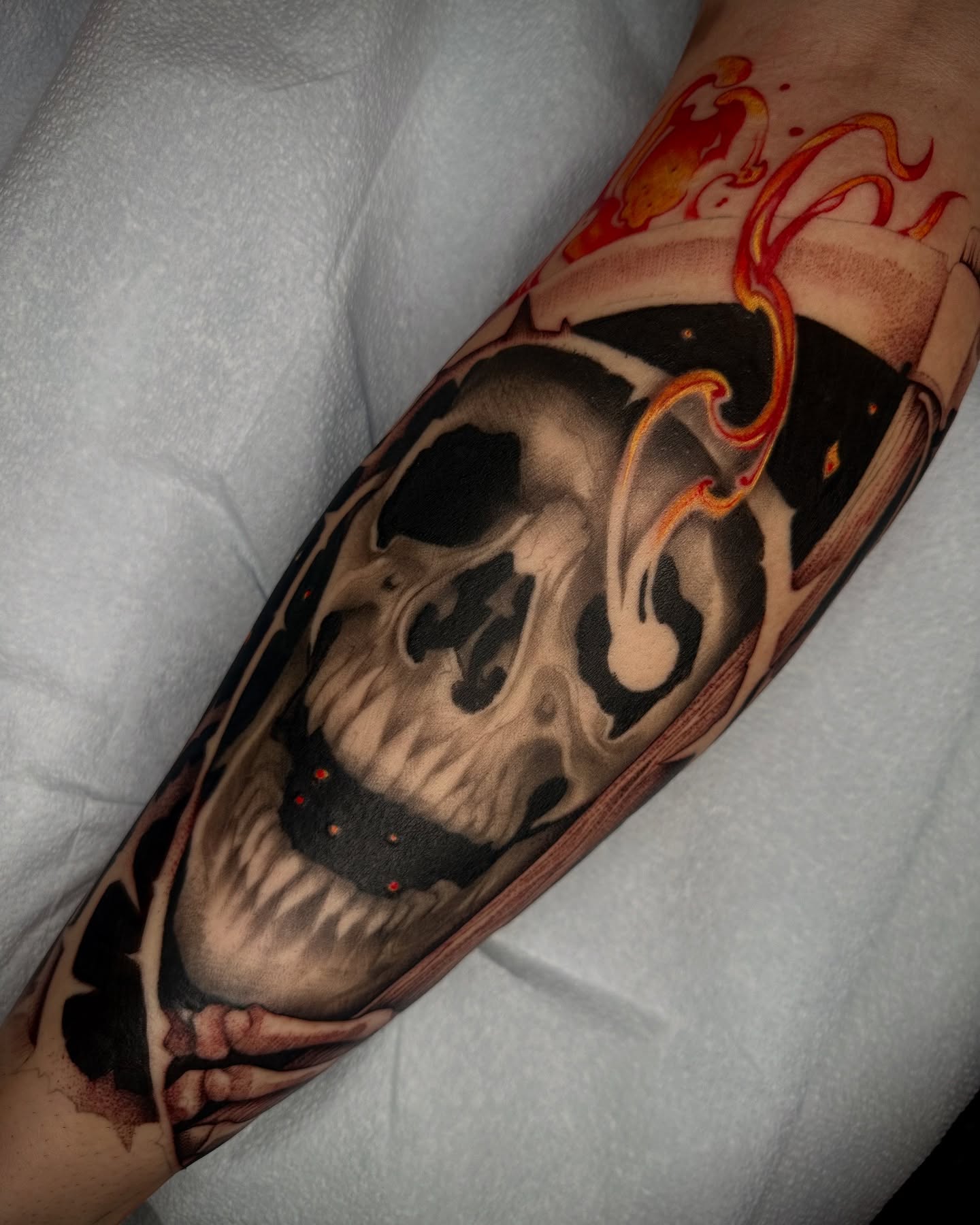 Skull realism tattoo on the forearm by Feliz Manzanedo, Prescott, Arizona
