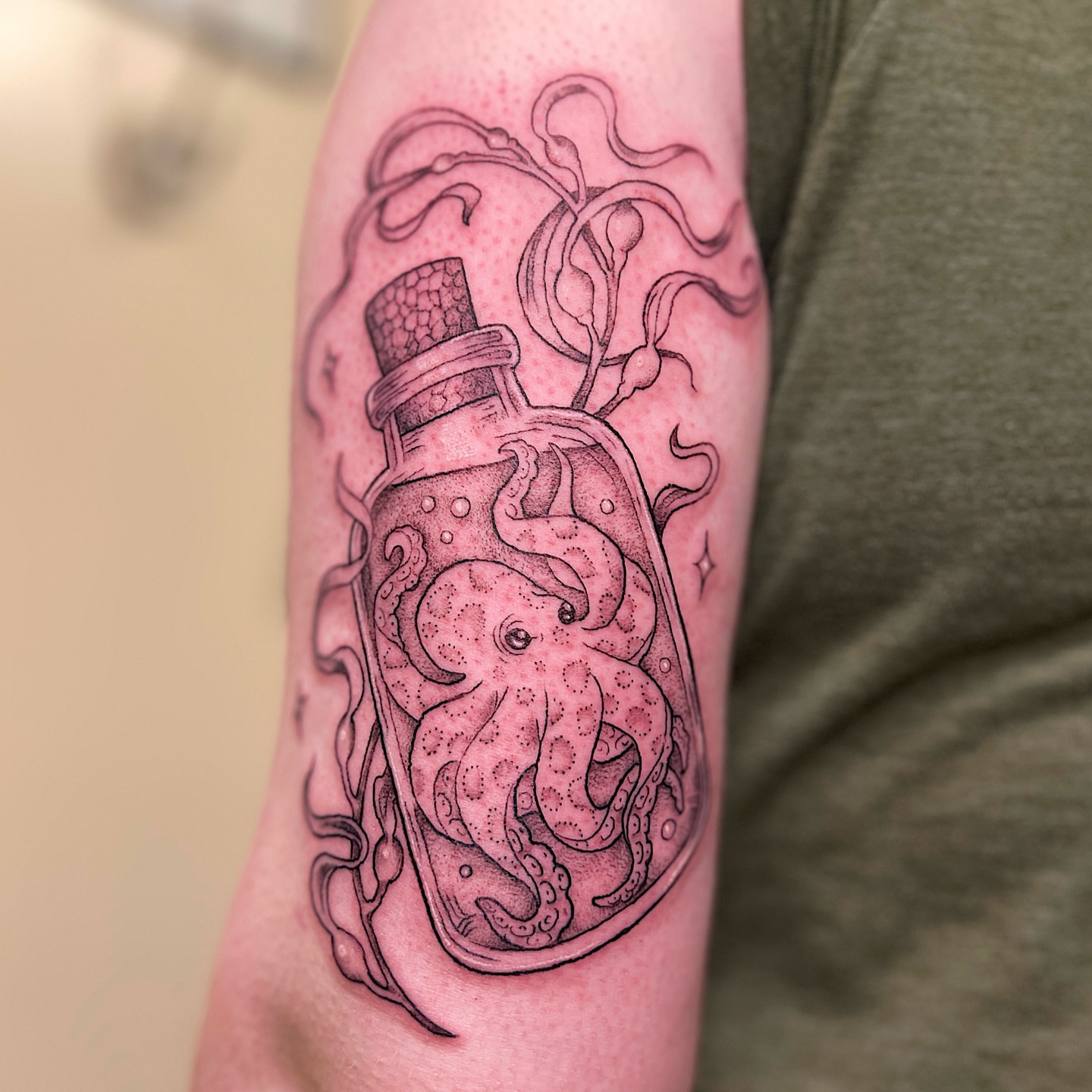 Octopus in bottle dotwork tattoo on the forearm by Kelsi Hooper, Seattle, Washington