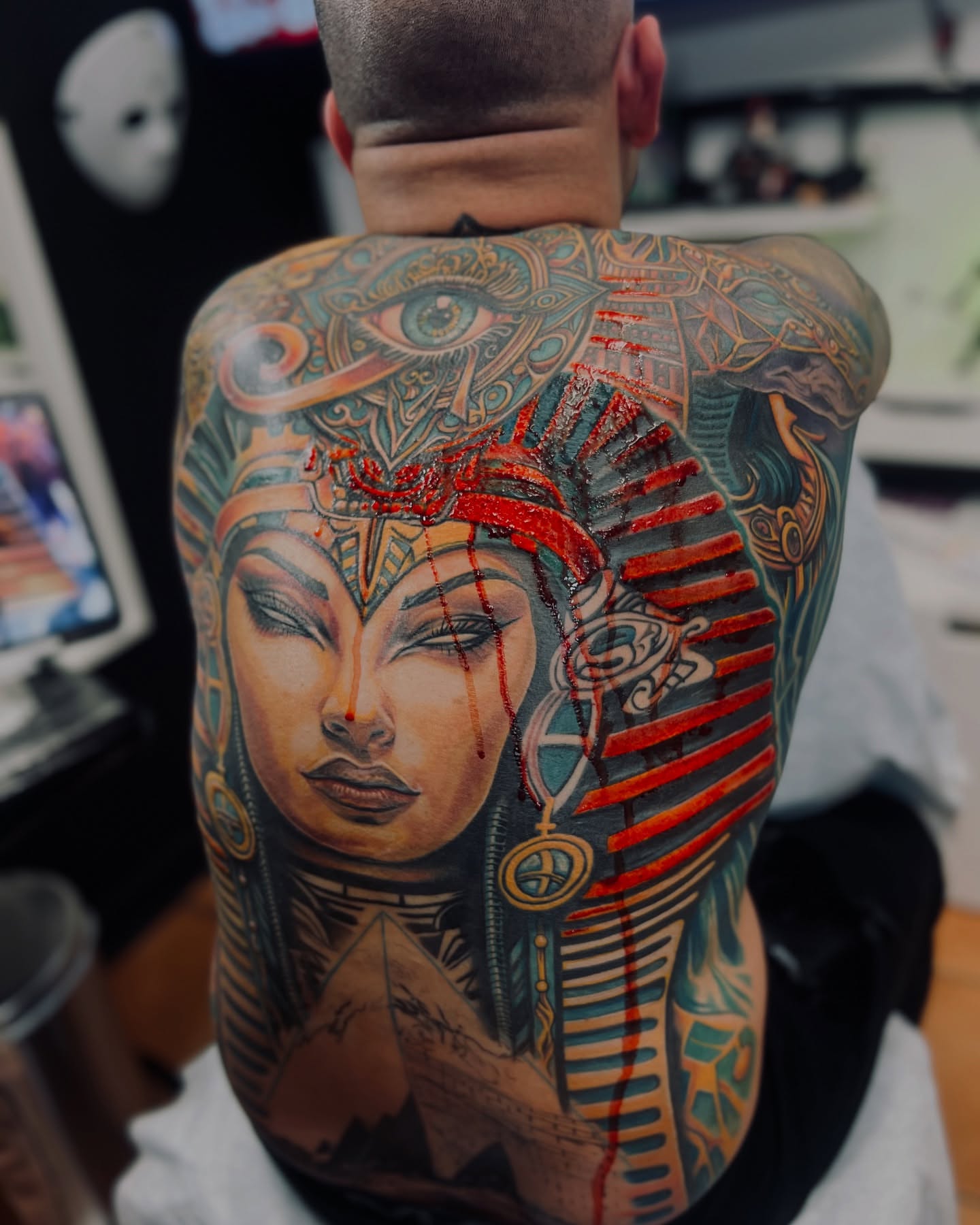 Pharaoh realism tattoo on the back by Yanko Reyes
