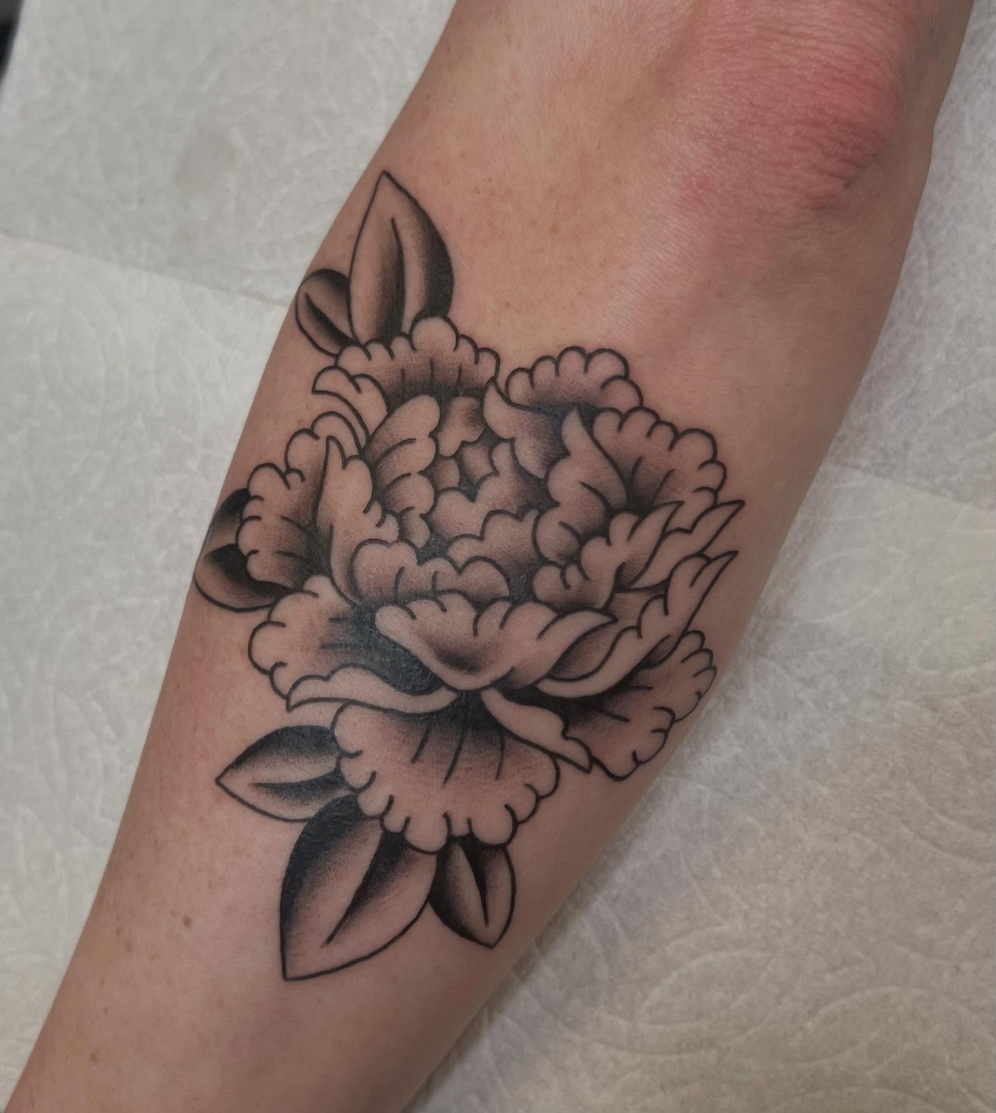 Peony black and grey tattoo on the forearm by Erika Donn, Portland, Oregon