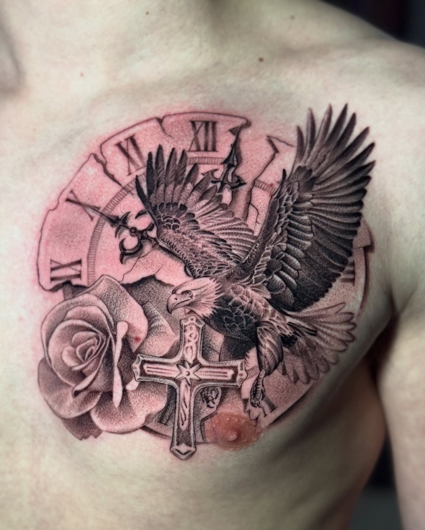 Eagle and clock black and grey tattoo on the chest by Zachary Kaufhold