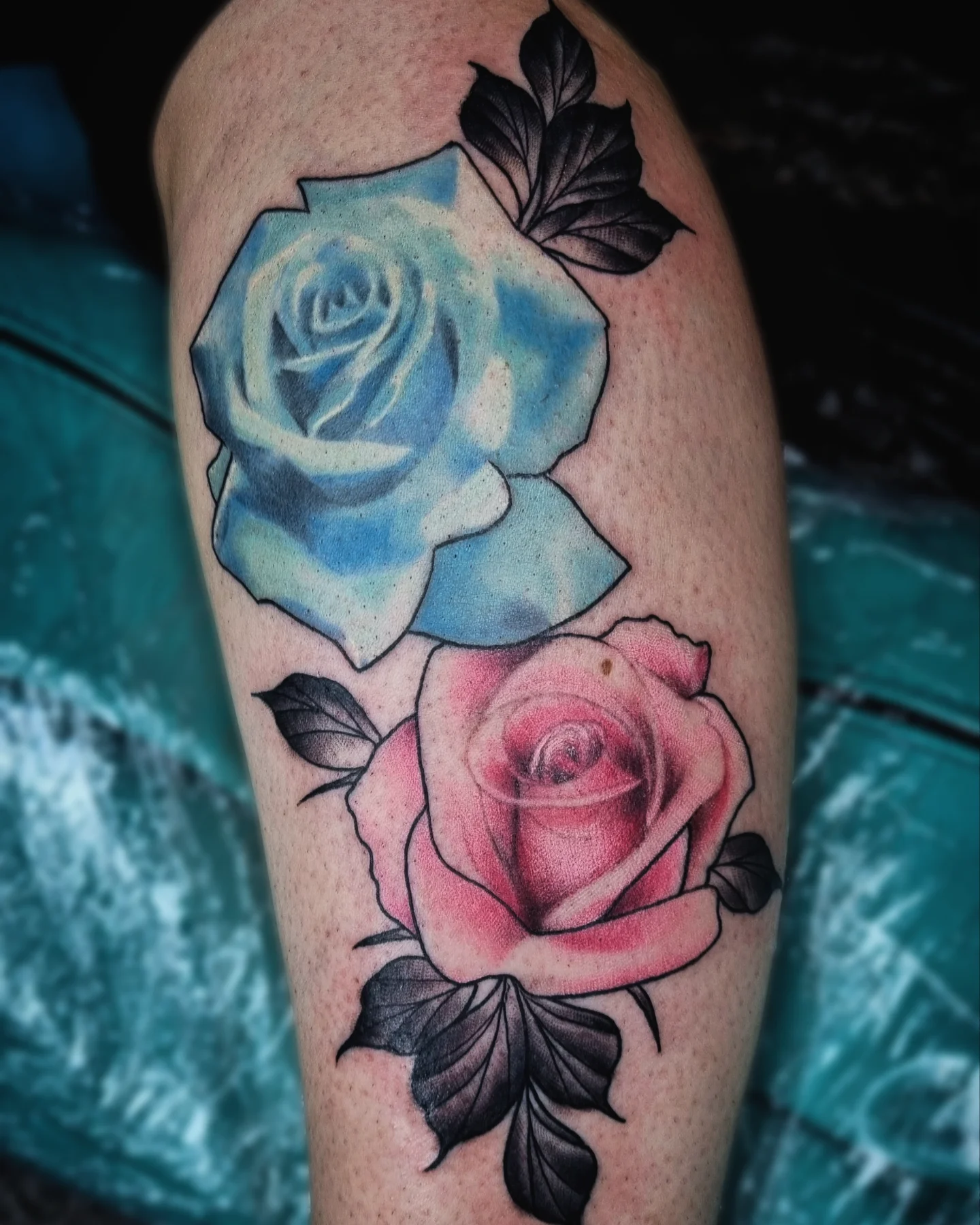 Roses realism tattoo on the forearm by AntiheroTattoo