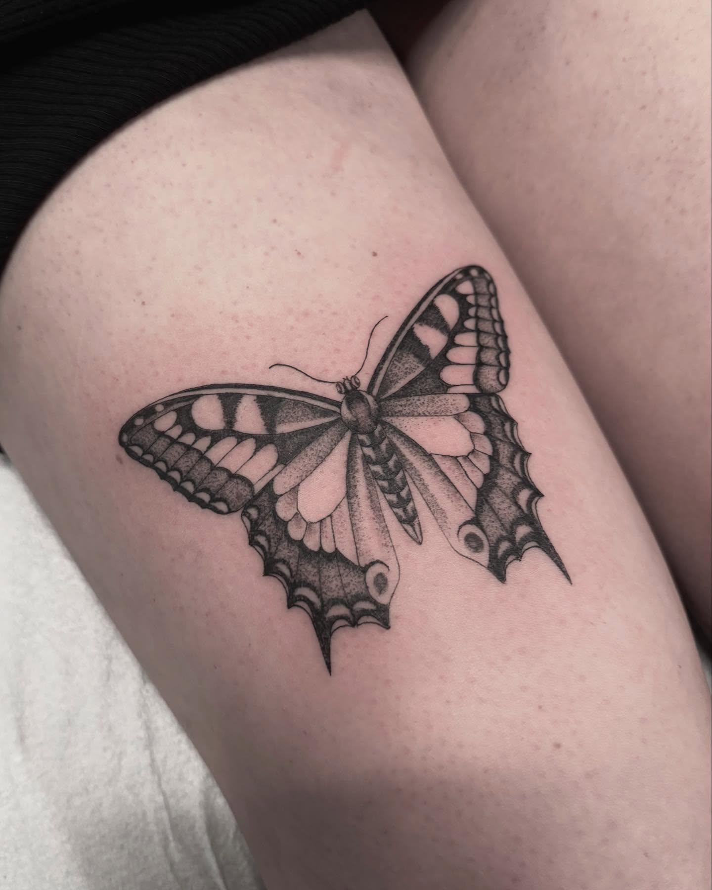 Butterfly dotwork tattoo on the thigh by Jake Hodson, Nashville, Tennessee