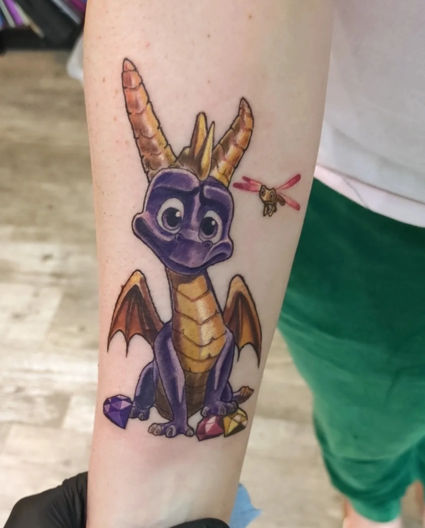 Spyro the Dragon illustrative tattoo on the forearm by Lahel (Lay-el) Fowler