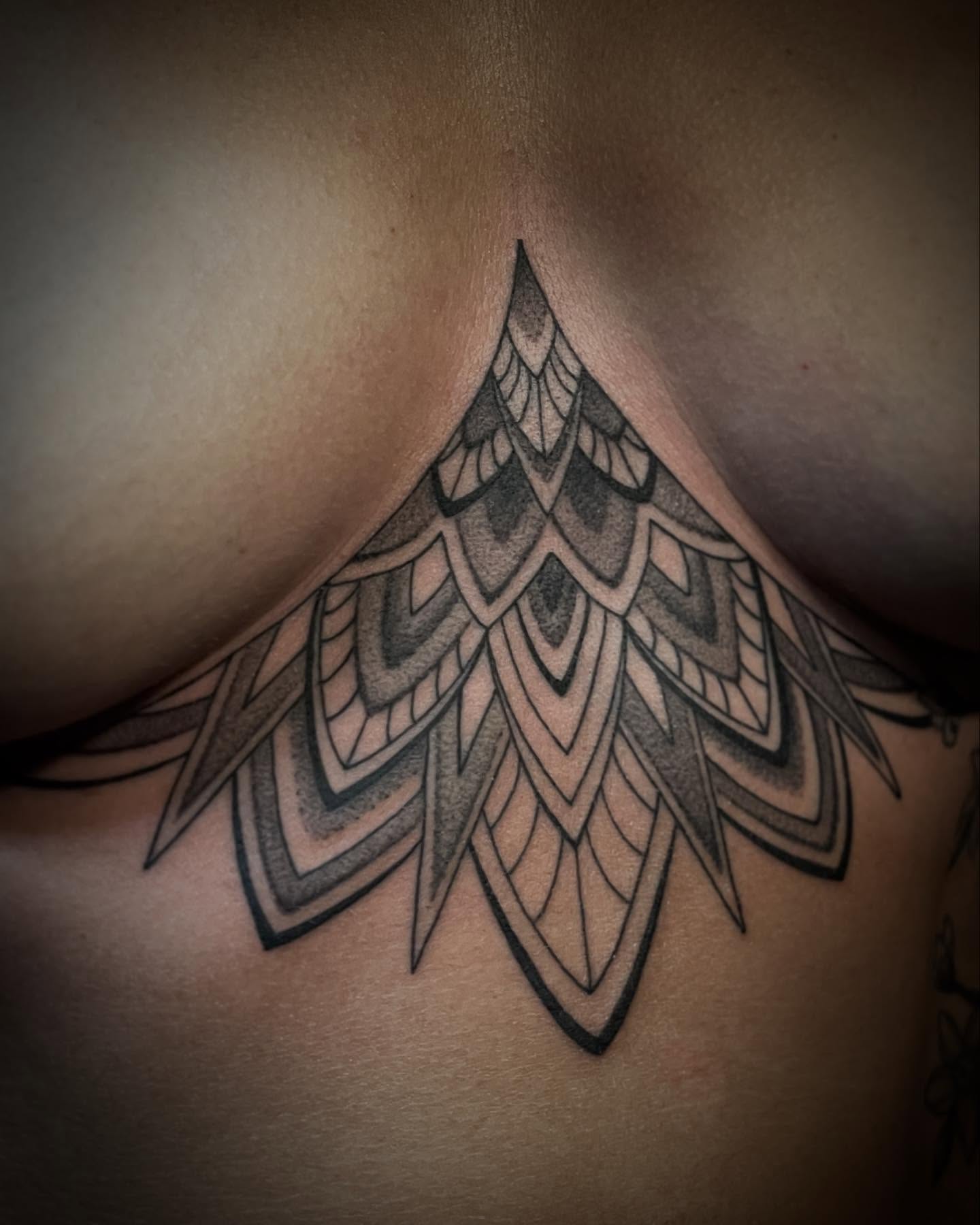 Geometric pattern geometric tattoo on the chest by Jacob Finelli
