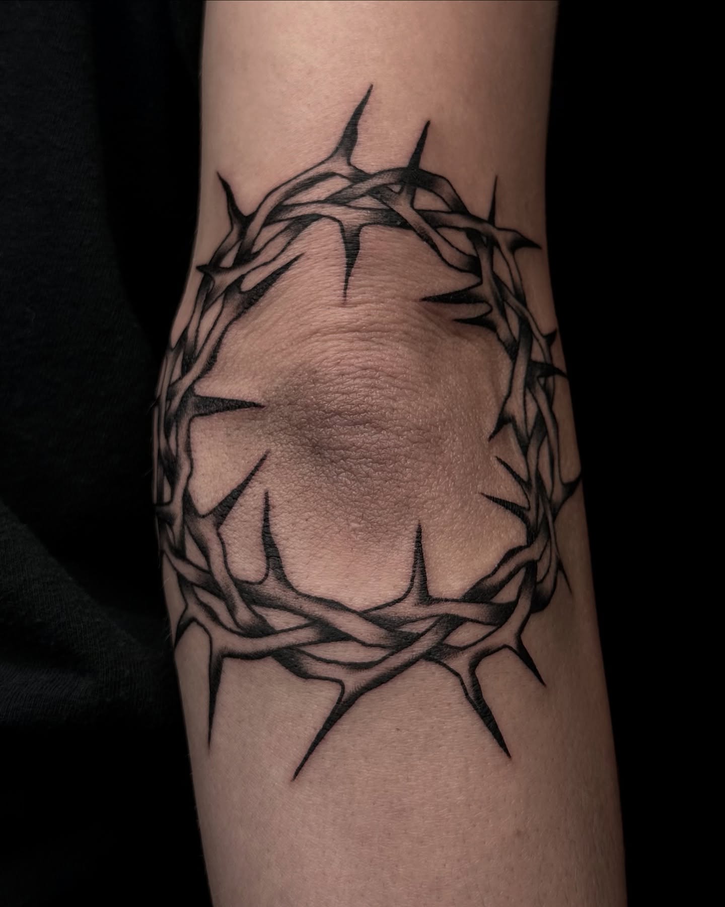 Crown of thorns black and grey tattoo on the forearm by Emersyn DeLuna