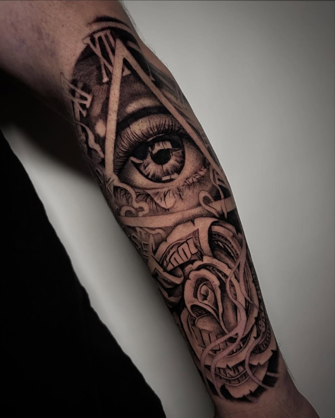 All-seeing eye with rose and money surrealism tattoo on the forearm by Marky