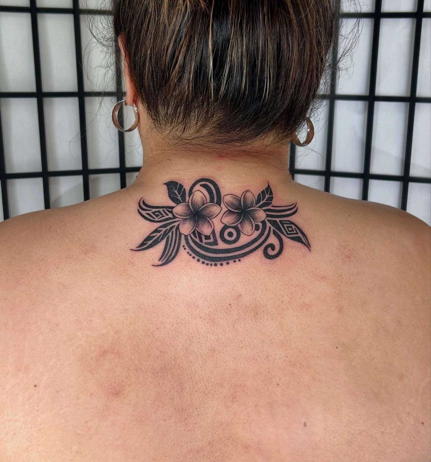 Plumeria flowers tribal tattoo on the back by ɢɢ sᴛʏʟᴇs