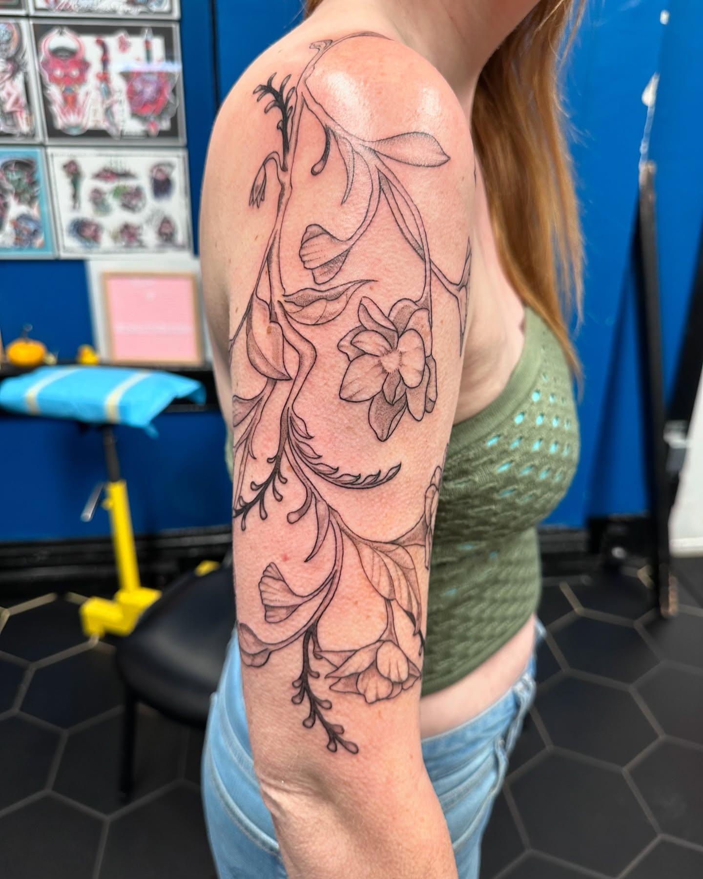 Floral vine black and grey tattoo on the upper arm by Shannon, Cincinnati, Ohio