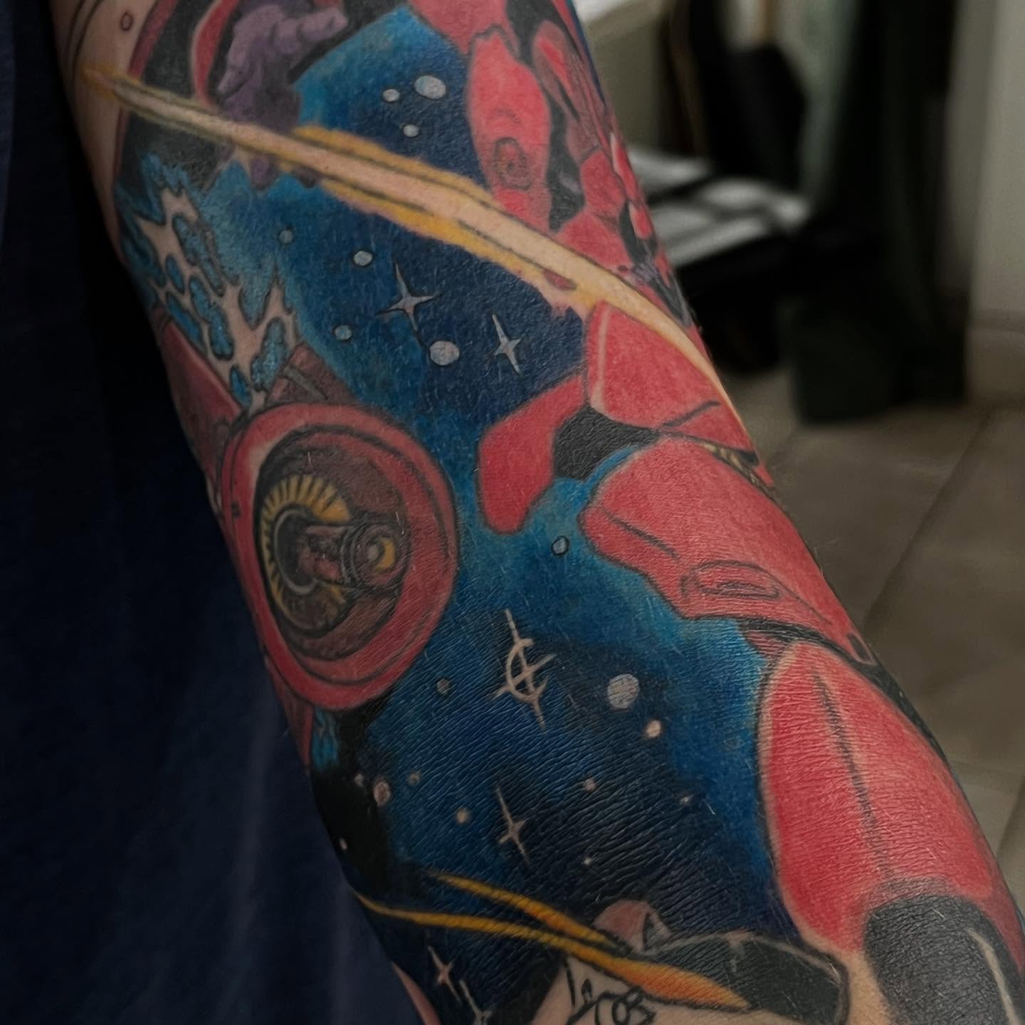 Space-themed tattoo dotwork tattoo on the forearm by Levi Cox, Powell, Ohio