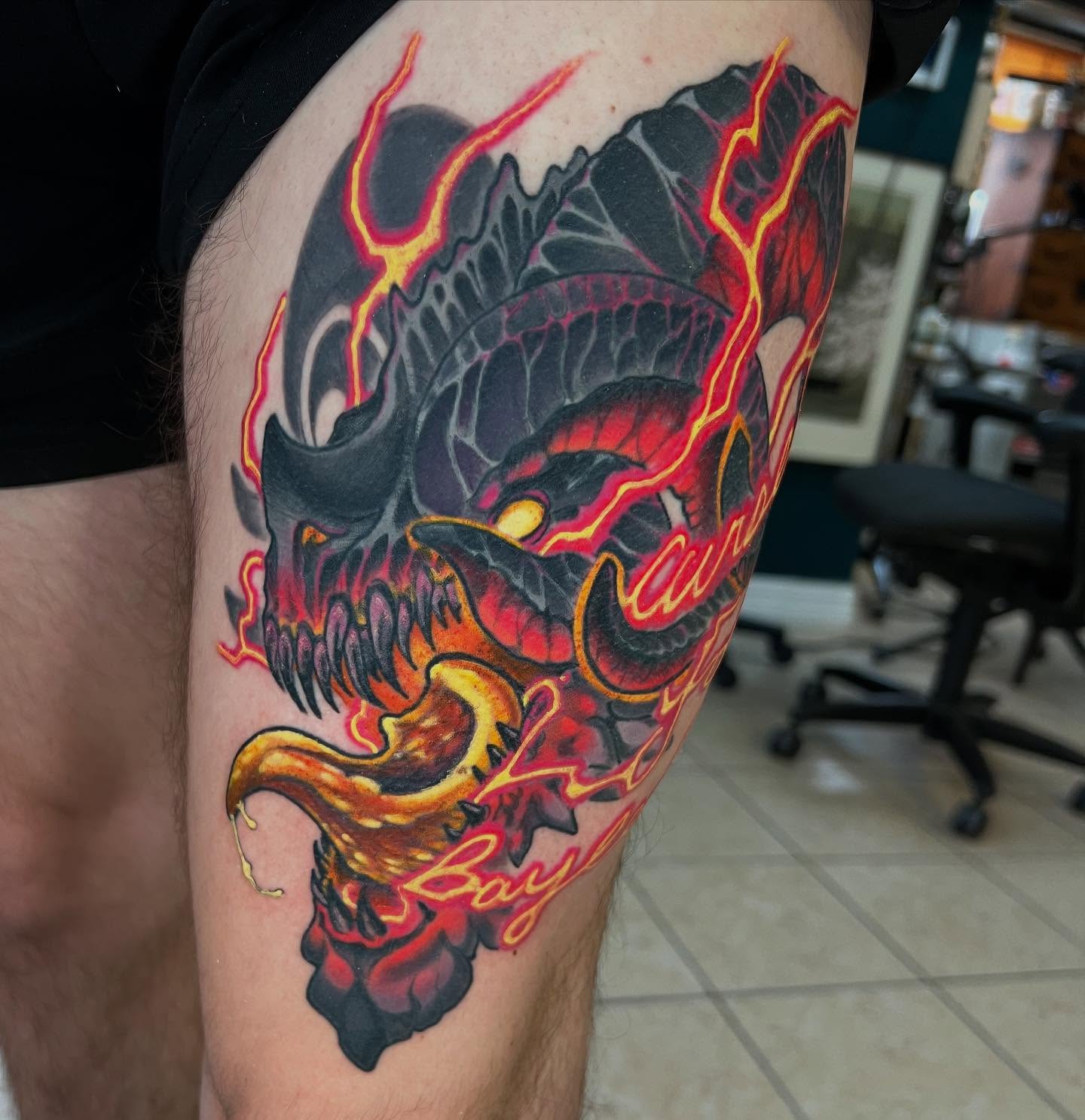 Demon skull dark realism tattoo on the thigh by Kate Erso