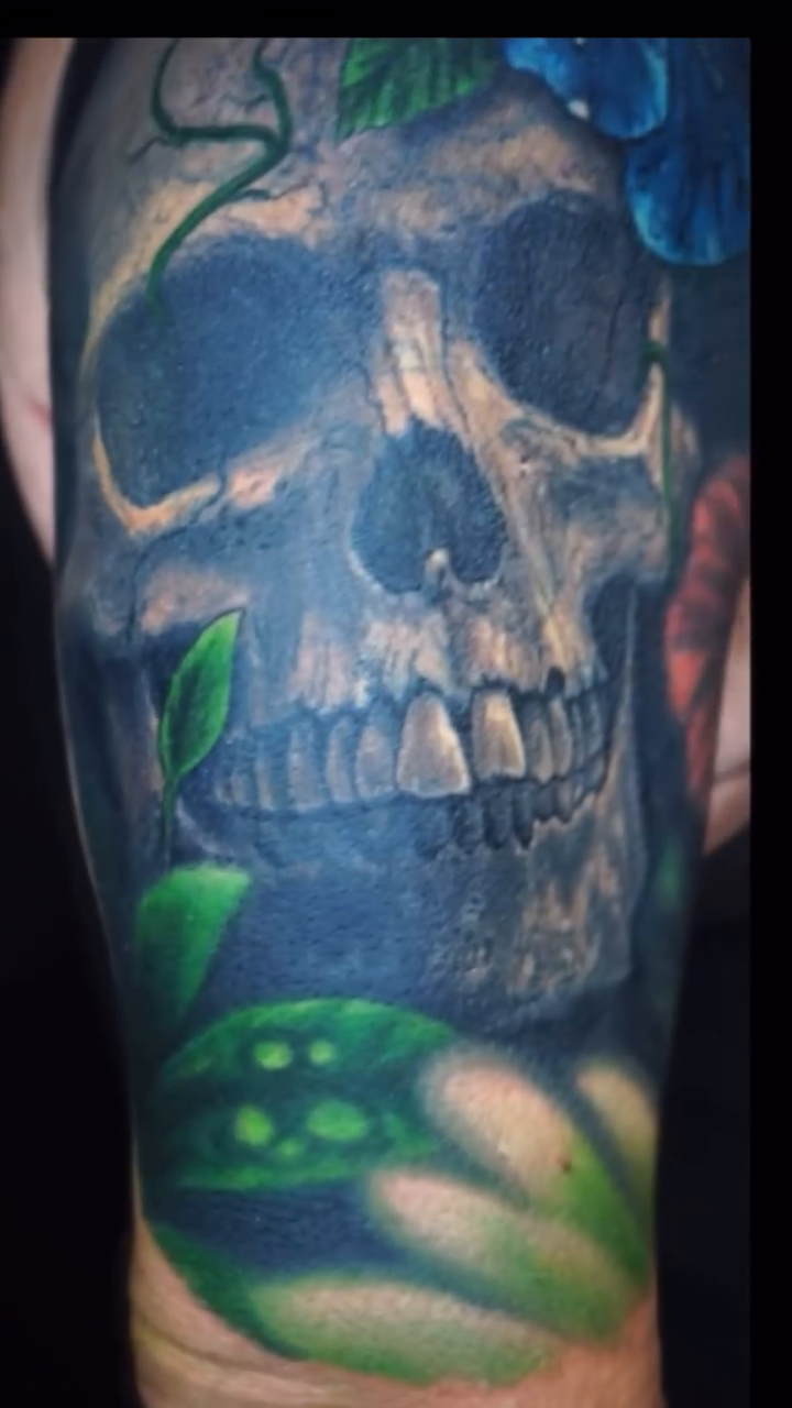 Skull with hibiscus flower realism tattoo by Tony Johnson - Tattoo Artist, Huntsville, Alabama