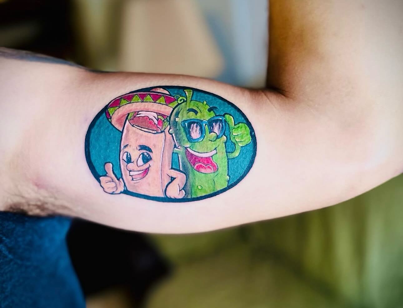 Burrito and pickle new school tattoo on the forearm by Ricky Flemate, San Antonio