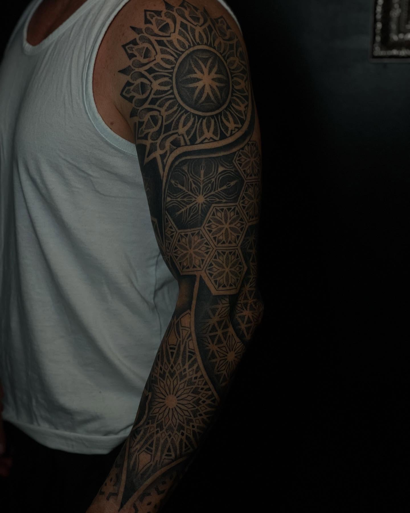 Geometric mandala geometric tattoo on the upper arm by Jesse (Dreadzilla)